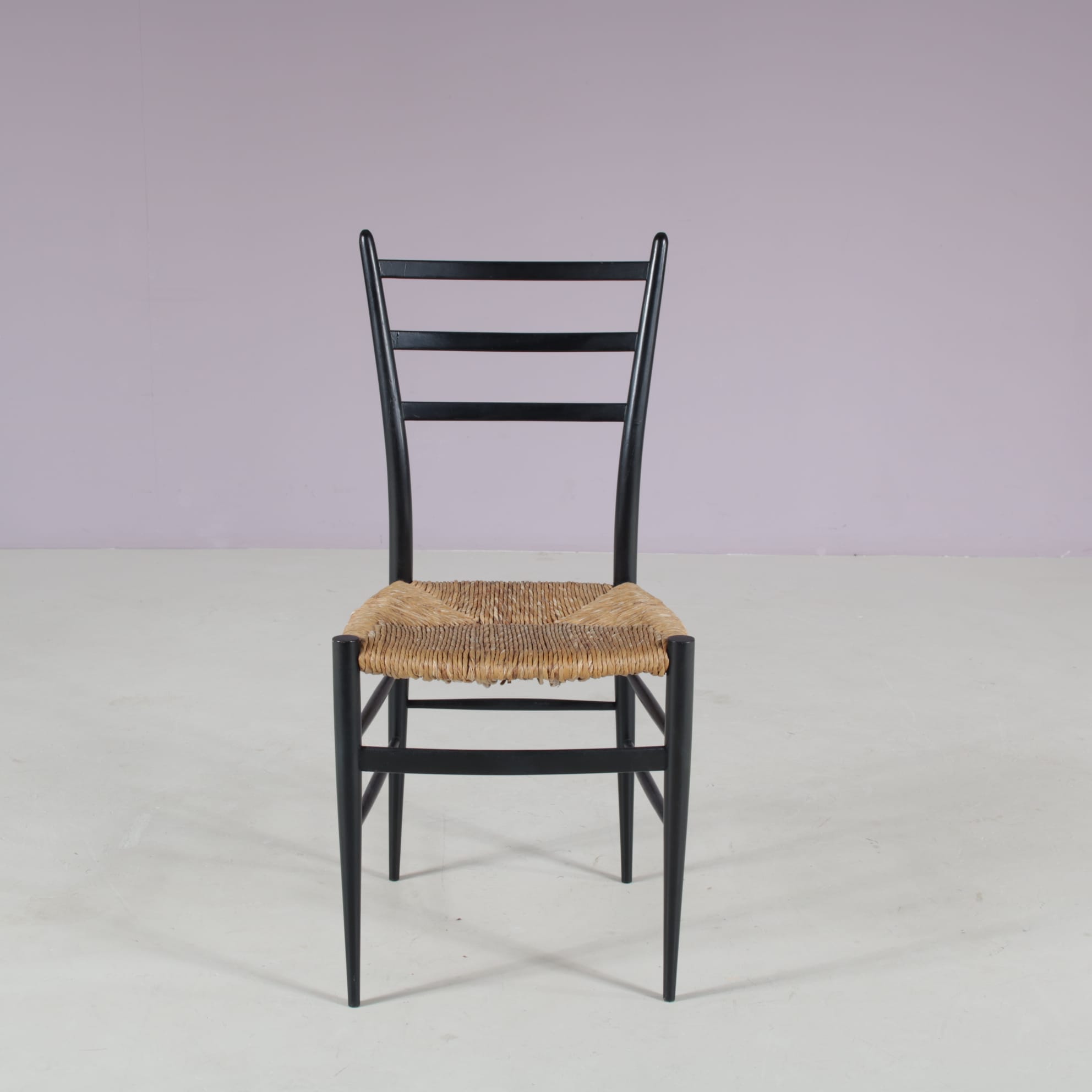 m28108 1950s Set of 4 Spinetto dining chairs in black wood with rush Chiavari, Italy