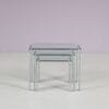 m28114 1970s Set of three nesting tables in chrome metal with glass tops / Netherlands