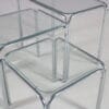 m28114 1970s Set of three nesting tables in chrome metal with glass tops / Netherlands