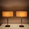 L5486 1960s Pair of table lamp on leather with brass and fabric shade, Belgium