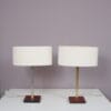 L5486 1960s Pair of table lamp on leather with brass and fabric shade, Belgium