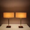 L5486 1960s Pair of table lamp on leather with brass and fabric shade, Belgium
