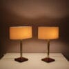 L5486 1960s Pair of table lamp on leather with brass and fabric shade, Belgium
