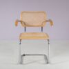 m28165 1970s Cesca chair with armrests on chrome plated metal base with webbing upholstery Italy