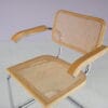 m28165 1970s Cesca chair with armrests on chrome plated metal base with webbing upholstery Italy