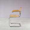 m28165 1970s Cesca chair with armrests on chrome plated metal base with webbing upholstery Italy