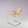 m28165 1970s Cesca chair with armrests on chrome plated metal base with webbing upholstery Italy