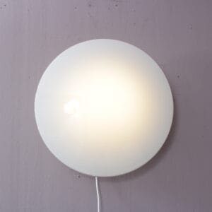 L5496 1950s Eklipta wall lamp in milk glass with white metal base Arne Jacobsen Louis Poulsen, Denmark