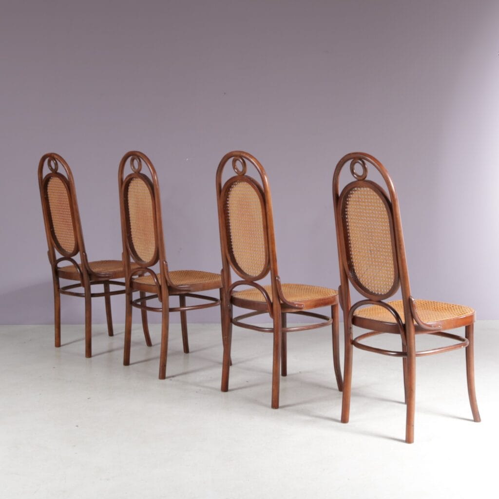 m28217 1950s Set of 4 Long John chairs by FMG, Poland