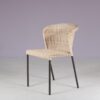 m28077 1950s Set of 4 dining chairs on black metal base with wicker upholstery, Netherlands