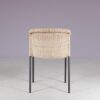m28077 1950s Set of 4 dining chairs on black metal base with wicker upholstery, Netherlands