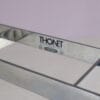 m28275-6 1980s Free standing coat rack in chrome plated pipe frame with black glass Thonet, Austria