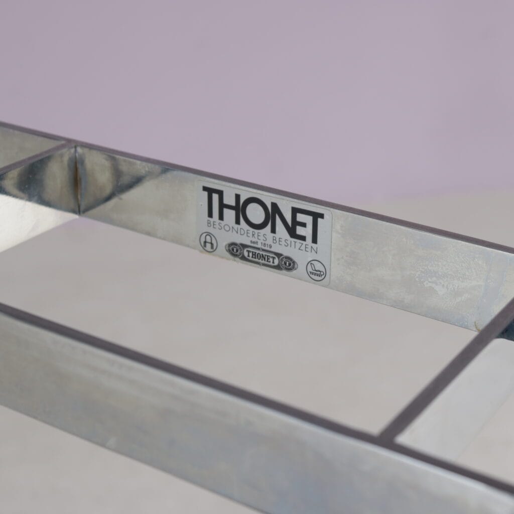 m28275-6 1980s Free standing coat rack in chrome plated pipe frame with black glass Thonet, Austria