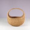 m28251 1960s Wicker baby crib on metal base Netherlands