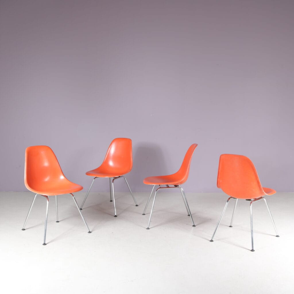 1960s Dining chairs in orange fiberglass on chrome metal H-base / Charles & Ray Eames / Herman Miller, USA